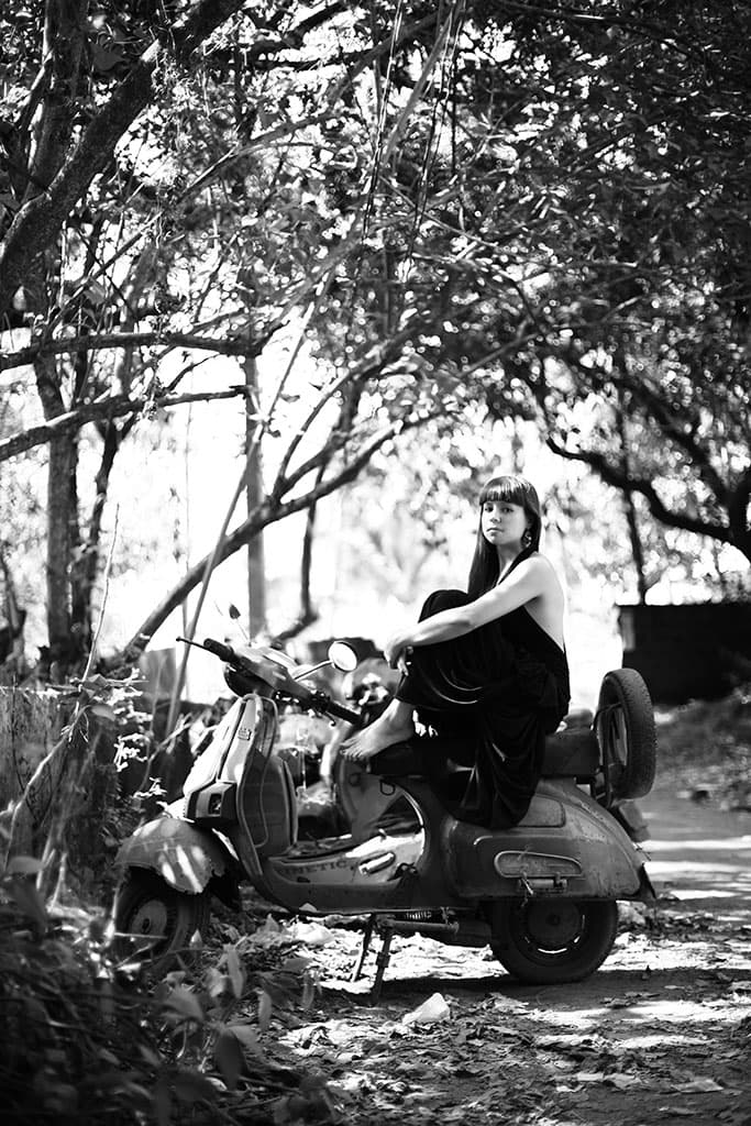 a young cute lady on bike